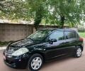 Чорний Ніссан Тііда, об'ємом двигуна 1.5 л та пробігом 40 тис. км за 8900 $, фото 1 на Automoto.ua