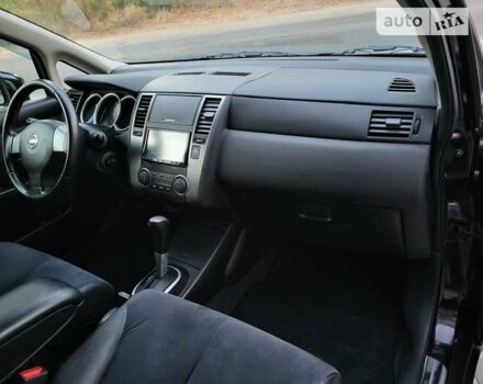 Черный Ниссан Тиида, объемом двигателя 1.5 л и пробегом 95 тыс. км за 8350 $, фото 10 на Automoto.ua