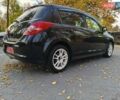 Чорний Ніссан Тііда, об'ємом двигуна 1.5 л та пробігом 84 тис. км за 8800 $, фото 4 на Automoto.ua