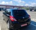 Черный Ниссан Тиида, объемом двигателя 1.5 л и пробегом 30 тыс. км за 8550 $, фото 5 на Automoto.ua