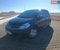 Черный Ниссан Тиида, объемом двигателя 1.6 л и пробегом 49 тыс. км за 8300 $, фото 1 на Automoto.ua