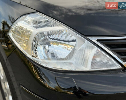 Черный Ниссан Тиида, объемом двигателя 1.6 л и пробегом 60 тыс. км за 9999 $, фото 22 на Automoto.ua