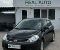 Черный Ниссан Тиида, объемом двигателя 1.6 л и пробегом 253 тыс. км за 5300 $, фото 1 на Automoto.ua