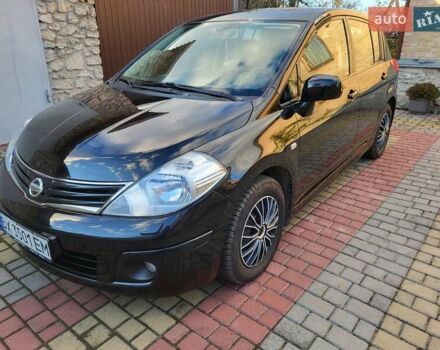 Черный Ниссан Тиида, объемом двигателя 1.6 л и пробегом 99 тыс. км за 7500 $, фото 2 на Automoto.ua