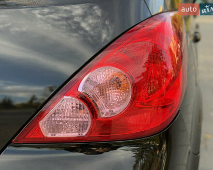 Черный Ниссан Тиида, объемом двигателя 1.6 л и пробегом 60 тыс. км за 9999 $, фото 32 на Automoto.ua