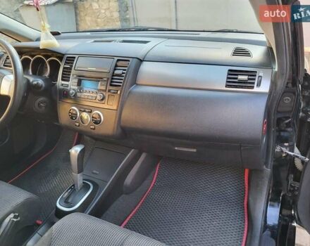 Черный Ниссан Тиида, объемом двигателя 1.6 л и пробегом 99 тыс. км за 7500 $, фото 5 на Automoto.ua