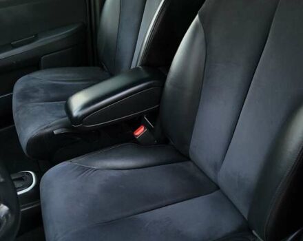 Черный Ниссан Тиида, объемом двигателя 1.5 л и пробегом 95 тыс. км за 8350 $, фото 25 на Automoto.ua