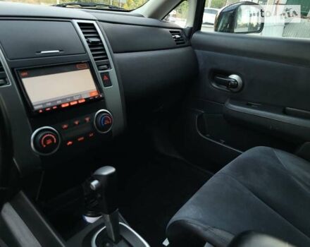 Черный Ниссан Тиида, объемом двигателя 1.5 л и пробегом 95 тыс. км за 8100 $, фото 23 на Automoto.ua