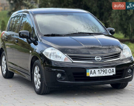 Черный Ниссан Тиида, объемом двигателя 1.6 л и пробегом 60 тыс. км за 9999 $, фото 4 на Automoto.ua
