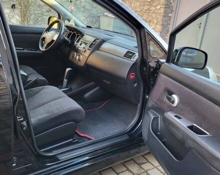 Черный Ниссан Тиида, объемом двигателя 1.6 л и пробегом 99 тыс. км за 7500 $, фото 4 на Automoto.ua