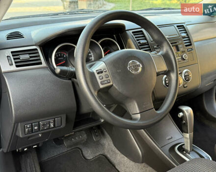 Черный Ниссан Тиида, объемом двигателя 1.6 л и пробегом 60 тыс. км за 9999 $, фото 64 на Automoto.ua