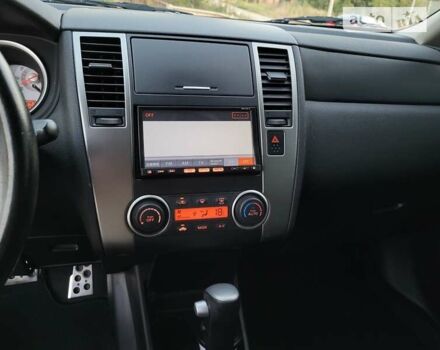 Чорний Ніссан Тііда, об'ємом двигуна 1.5 л та пробігом 95 тис. км за 7999 $, фото 16 на Automoto.ua