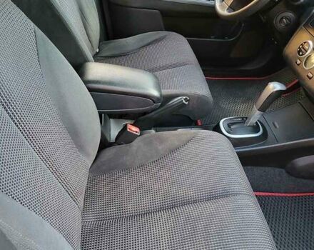 Черный Ниссан Тиида, объемом двигателя 1.6 л и пробегом 99 тыс. км за 7500 $, фото 6 на Automoto.ua