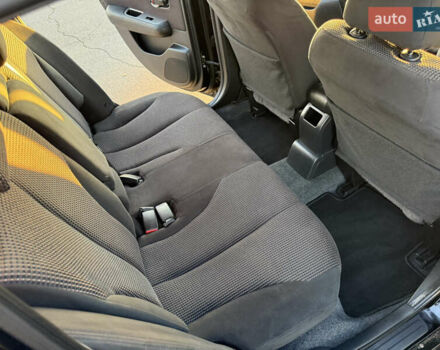 Черный Ниссан Тиида, объемом двигателя 1.6 л и пробегом 60 тыс. км за 9999 $, фото 95 на Automoto.ua