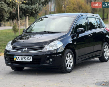 Черный Ниссан Тиида, объемом двигателя 1.6 л и пробегом 60 тыс. км за 9999 $, фото 1 на Automoto.ua