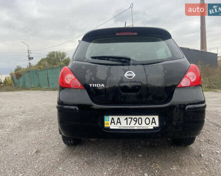 Черный Ниссан Тиида, объемом двигателя 1.6 л и пробегом 60 тыс. км за 9600 $, фото 2 на Automoto.ua