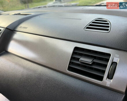 Черный Ниссан Тиида, объемом двигателя 1.6 л и пробегом 60 тыс. км за 9999 $, фото 48 на Automoto.ua