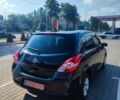 Черный Ниссан Тиида, объемом двигателя 1.5 л и пробегом 30 тыс. км за 8550 $, фото 6 на Automoto.ua
