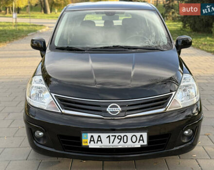 Черный Ниссан Тиида, объемом двигателя 1.6 л и пробегом 60 тыс. км за 9999 $, фото 19 на Automoto.ua