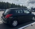 Черный Ниссан Тиида, объемом двигателя 1.6 л и пробегом 144 тыс. км за 8200 $, фото 1 на Automoto.ua