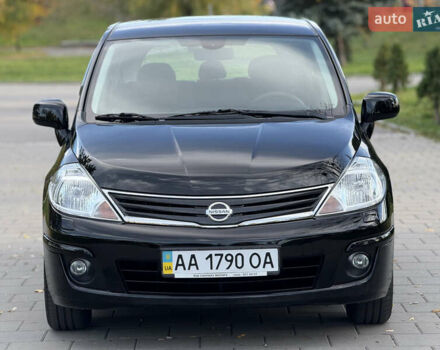 Черный Ниссан Тиида, объемом двигателя 1.6 л и пробегом 60 тыс. км за 9999 $, фото 3 на Automoto.ua