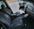 Черный Ниссан Тиида, объемом двигателя 1.5 л и пробегом 95 тыс. км за 8100 $, фото 12 на Automoto.ua