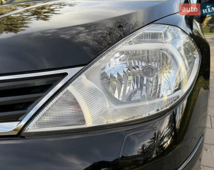 Черный Ниссан Тиида, объемом двигателя 1.6 л и пробегом 60 тыс. км за 9999 $, фото 16 на Automoto.ua