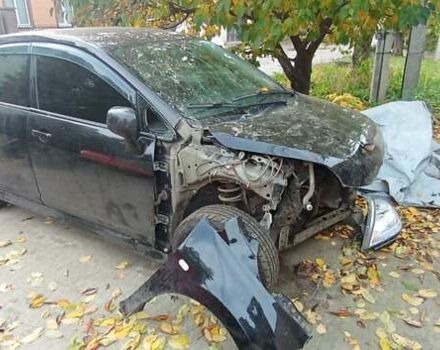 Чорний Ніссан Тііда, об'ємом двигуна 1.6 л та пробігом 280 тис. км за 2000 $, фото 7 на Automoto.ua