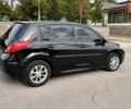 Черный Ниссан Тиида, объемом двигателя 1.6 л и пробегом 190 тыс. км за 7700 $, фото 6 на Automoto.ua
