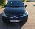 Черный Ниссан Тиида, объемом двигателя 1.6 л и пробегом 117 тыс. км за 8500 $, фото 1 на Automoto.ua