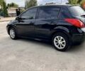 Черный Ниссан Тиида, объемом двигателя 1.6 л и пробегом 190 тыс. км за 7700 $, фото 5 на Automoto.ua