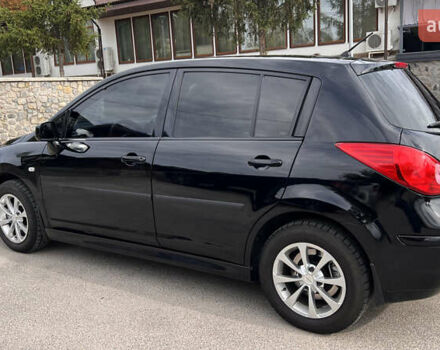 Черный Ниссан Тиида, объемом двигателя 1.6 л и пробегом 190 тыс. км за 7700 $, фото 2 на Automoto.ua