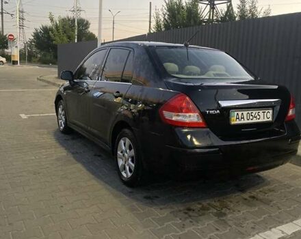 Черный Ниссан Тиида, объемом двигателя 1.6 л и пробегом 200 тыс. км за 4250 $, фото 2 на Automoto.ua