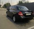 Черный Ниссан Тиида, объемом двигателя 1.6 л и пробегом 200 тыс. км за 4250 $, фото 2 на Automoto.ua