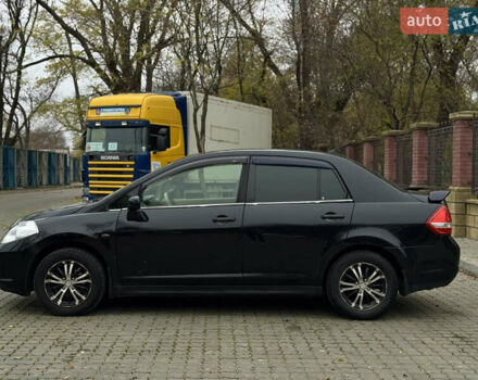 Черный Ниссан Тиида, объемом двигателя 1.6 л и пробегом 132 тыс. км за 4850 $, фото 1 на Automoto.ua