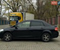 Черный Ниссан Тиида, объемом двигателя 1.6 л и пробегом 132 тыс. км за 4850 $, фото 1 на Automoto.ua