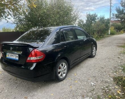 Черный Ниссан Тиида, объемом двигателя 1.6 л и пробегом 304 тыс. км за 4700 $, фото 3 на Automoto.ua