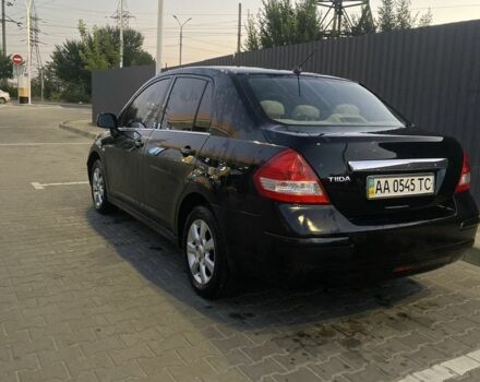Черный Ниссан Тиида, объемом двигателя 1.6 л и пробегом 200 тыс. км за 4100 $, фото 3 на Automoto.ua