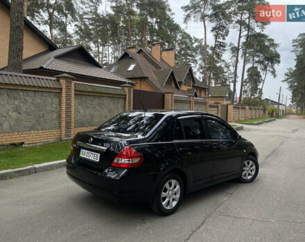 Черный Ниссан Тиида, объемом двигателя 1.6 л и пробегом 188 тыс. км за 5850 $, фото 10 на Automoto.ua