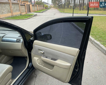 Черный Ниссан Тиида, объемом двигателя 1.6 л и пробегом 188 тыс. км за 5850 $, фото 25 на Automoto.ua