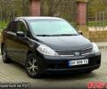 Черный Ниссан Тиида, объемом двигателя 1.6 л и пробегом 130 тыс. км за 4999 $, фото 1 на Automoto.ua