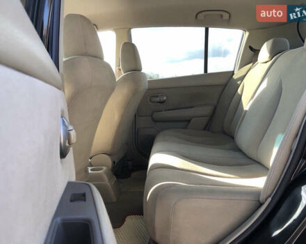 Черный Ниссан Тиида, объемом двигателя 1.6 л и пробегом 257 тыс. км за 5600 $, фото 15 на Automoto.ua