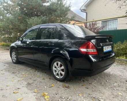 Черный Ниссан Тиида, объемом двигателя 1.6 л и пробегом 304 тыс. км за 4700 $, фото 7 на Automoto.ua