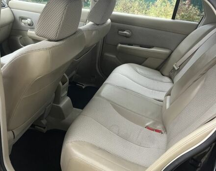 Черный Ниссан Тиида, объемом двигателя 1.6 л и пробегом 304 тыс. км за 4700 $, фото 10 на Automoto.ua