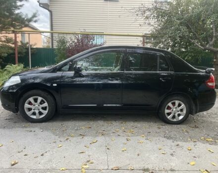 Черный Ниссан Тиида, объемом двигателя 1.6 л и пробегом 304 тыс. км за 4700 $, фото 6 на Automoto.ua