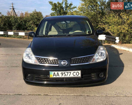 Черный Ниссан Тиида, объемом двигателя 1.6 л и пробегом 257 тыс. км за 5600 $, фото 11 на Automoto.ua