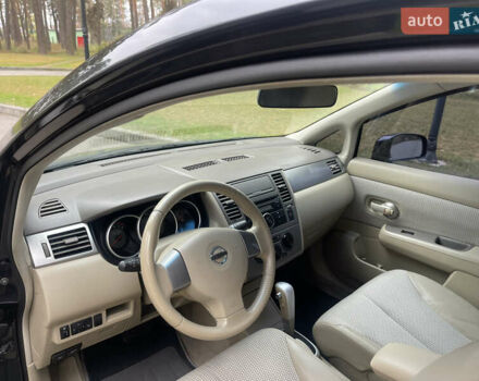 Черный Ниссан Тиида, объемом двигателя 1.6 л и пробегом 188 тыс. км за 5850 $, фото 16 на Automoto.ua