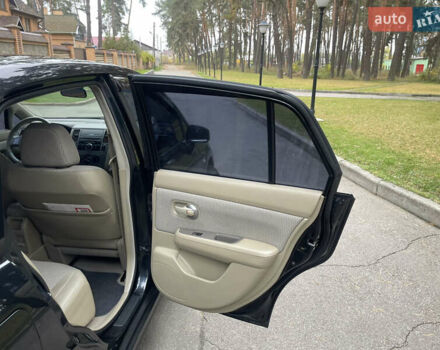 Черный Ниссан Тиида, объемом двигателя 1.6 л и пробегом 188 тыс. км за 5850 $, фото 22 на Automoto.ua