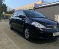 Черный Ниссан Тиида, объемом двигателя 1.6 л и пробегом 200 тыс. км за 4100 $, фото 2 на Automoto.ua