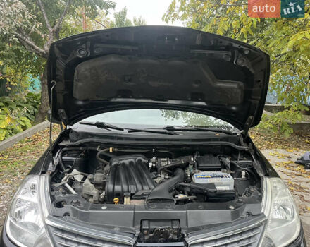 Черный Ниссан Тиида, объемом двигателя 1.6 л и пробегом 304 тыс. км за 4600 $, фото 15 на Automoto.ua